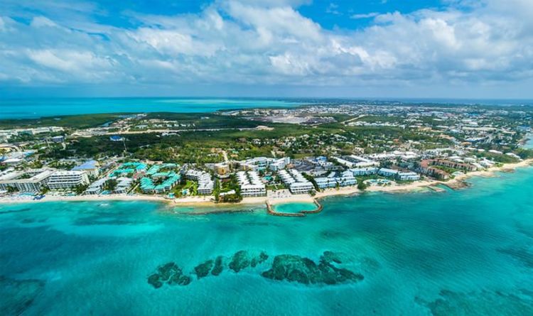Puis-je aller à Grand Cayman pendant mes vacances?