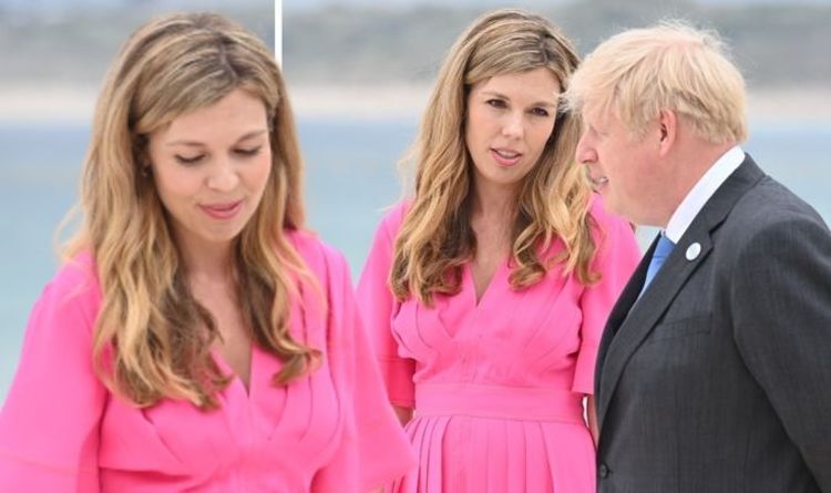 Carrie Symonds porte une robe en soie fuchsia à 1 400 £ pour la photo officielle du G7 avec Boris