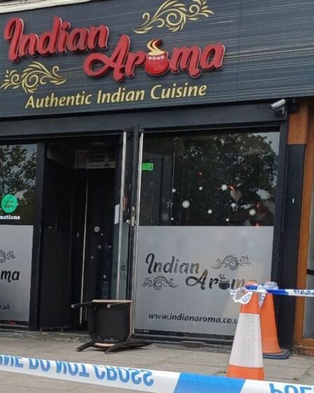 Garçon, 15 ans, et l'homme arrêté après que le restaurant d'Ilford, le feu en laisse trois dans un état critique