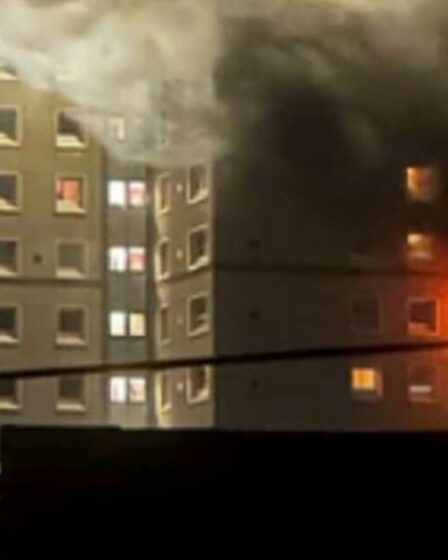 Un enfer d’horreur engloutit la tour Motherwell alors qu’un homme meurt en plongeant dans un bâtiment en feu